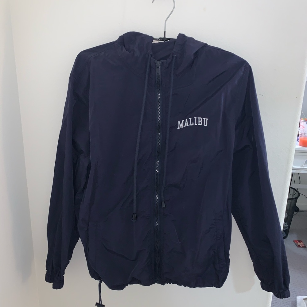 Blue “Malibu” windbreaker from Brandy Melville